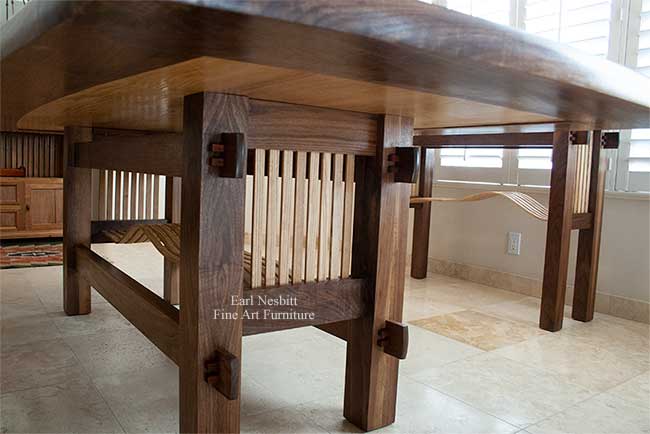 classic dining table showing pegged through tenon joinery on table base